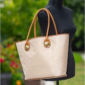 MCM Ivory Canvas Shopper Tote. Leather is great. Comes with full size organizer.